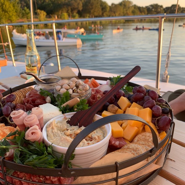 a wooden boat in a body of water